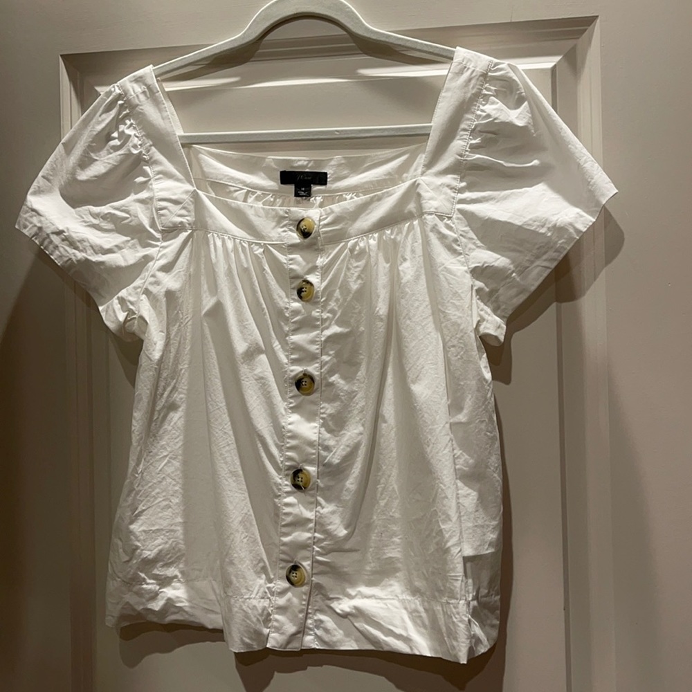 Woman’s white short sleeve blouse!